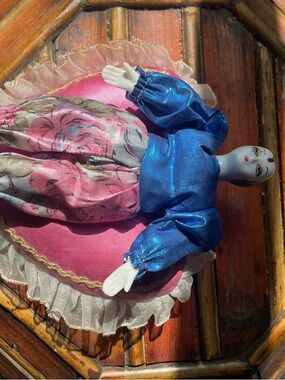 Handmade Porcelain Doll in Blue and Pink Floral Dress on heart shape cusion